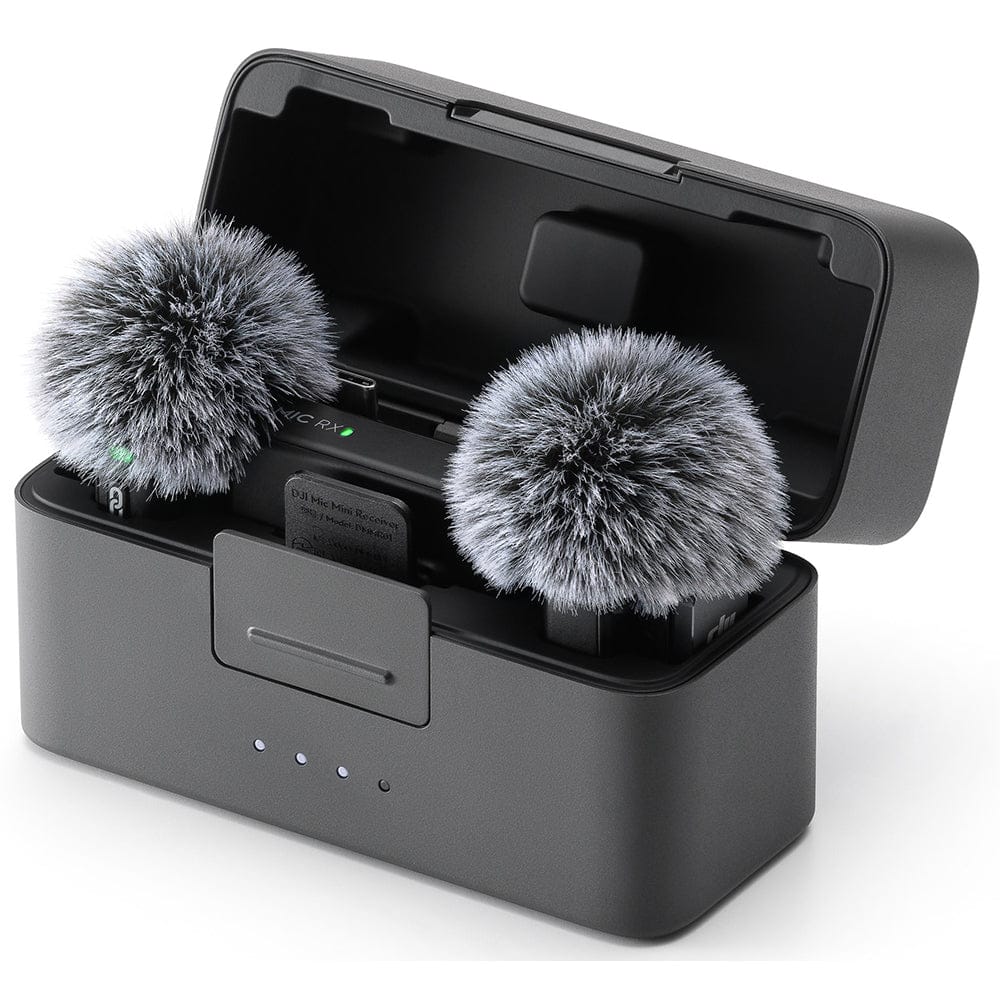 DJI Mic Mini wireless microphone system with 2 transmitters, 1 receiver, and charging case, featuring a compact lightweight design, high-quality audio recording, intelligent noise reduction, long battery life, and reliable wireless connectivity for vlogging, interviews, livestreaming, filmmaking, and content creation.